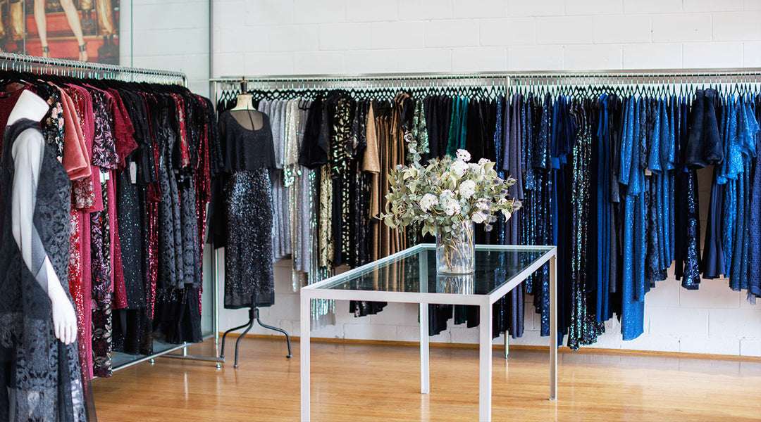 Lisa Barron cocktail wear collection of midi evening dresses, mother of the bride groom dresses and evening pantsuits